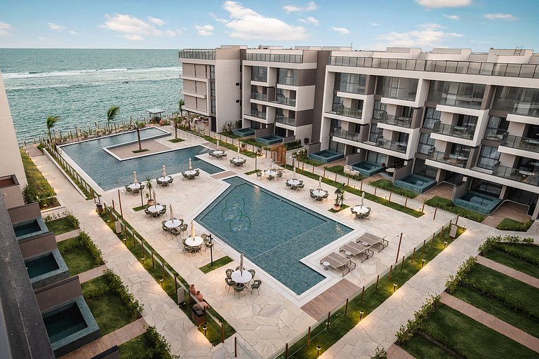 Flat Premium pé na areia de Muro Alto, By Sintta